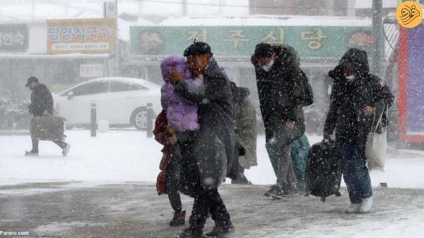 برف و سرما در ژاپن و کره پروازها و حرکت قطارها را لغو کرد